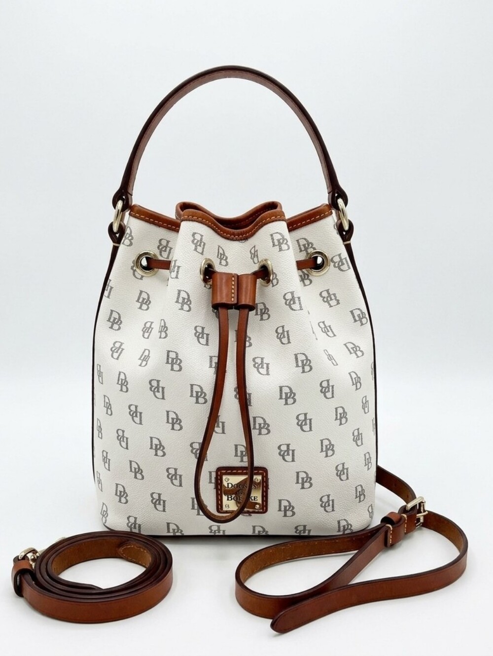 Dooney & Bourke 1975 Bone Gretta Drawstring Bucket Bag With Brown Trim And Strap